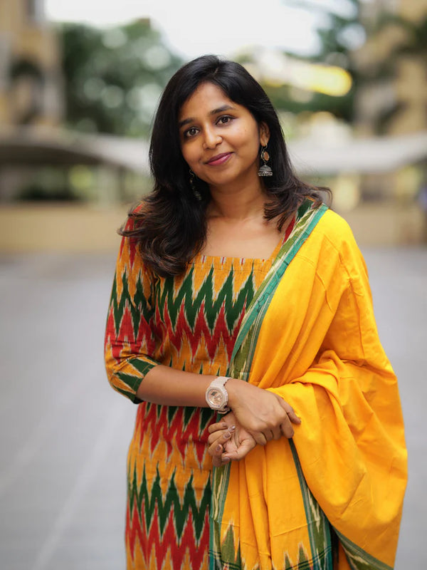 Ikkath suit is vibrant colors and geometric or traditional designs.